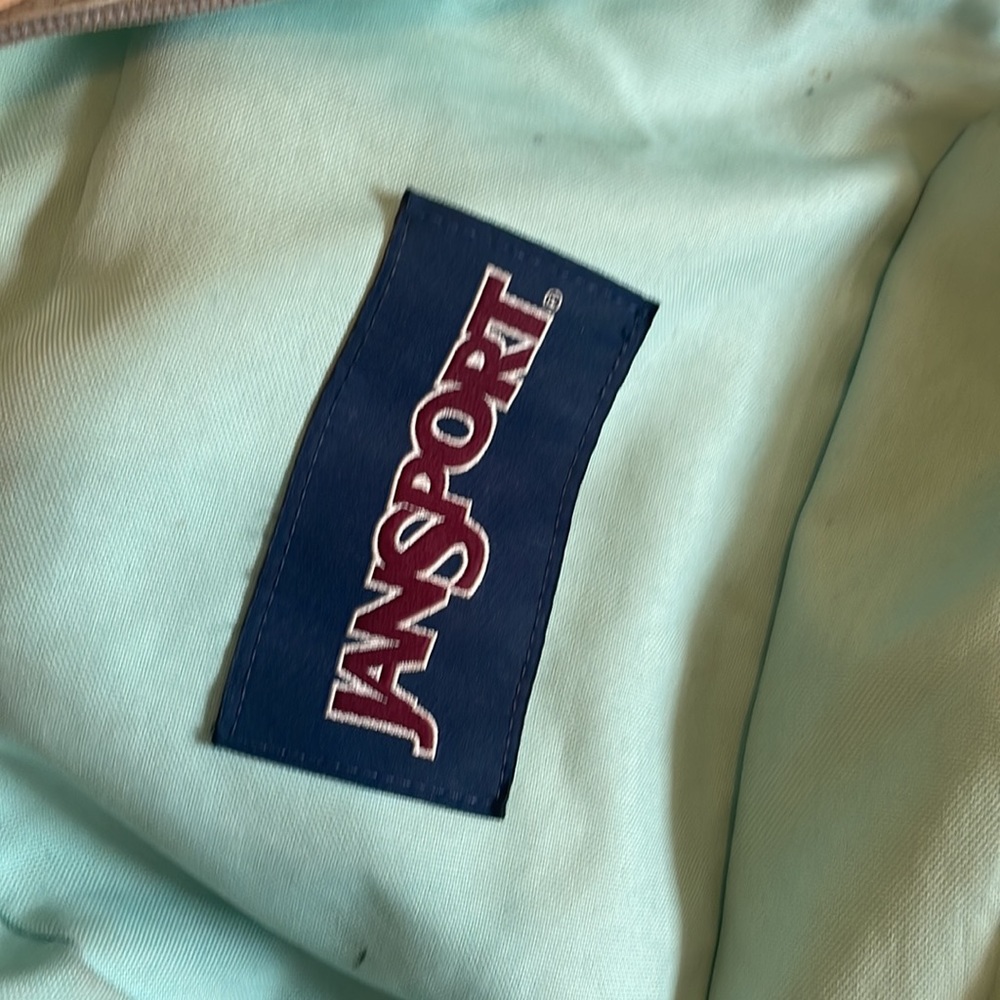 Jansport light green bag pack